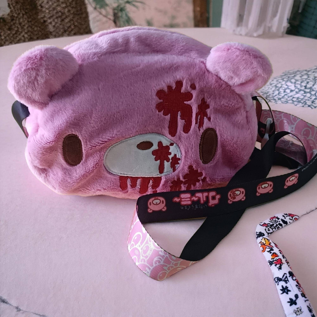 Gloomy Bear plush crossbody bag: Pink, cute - edgy with “blood - splatter” details. A fun, unique pick for fans.