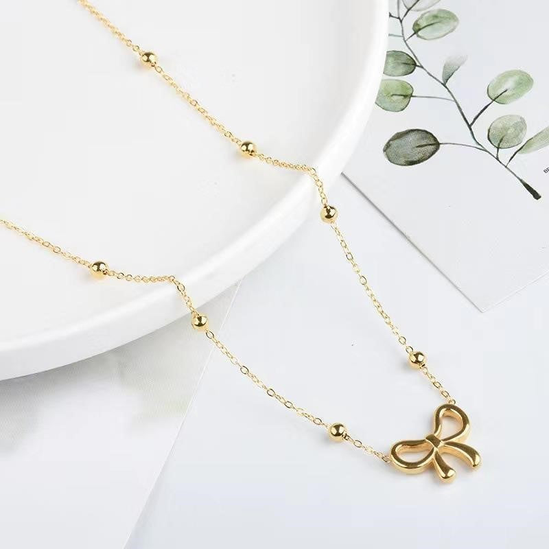 ANENJERY L316 Stainless Steel Beads Chain Hollow Bowknot Pendant Necklace for Women Niche Simple Jewery Accessory