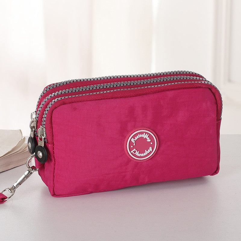 New long women's clutch, three-layer zipper, large-capacity coin purse