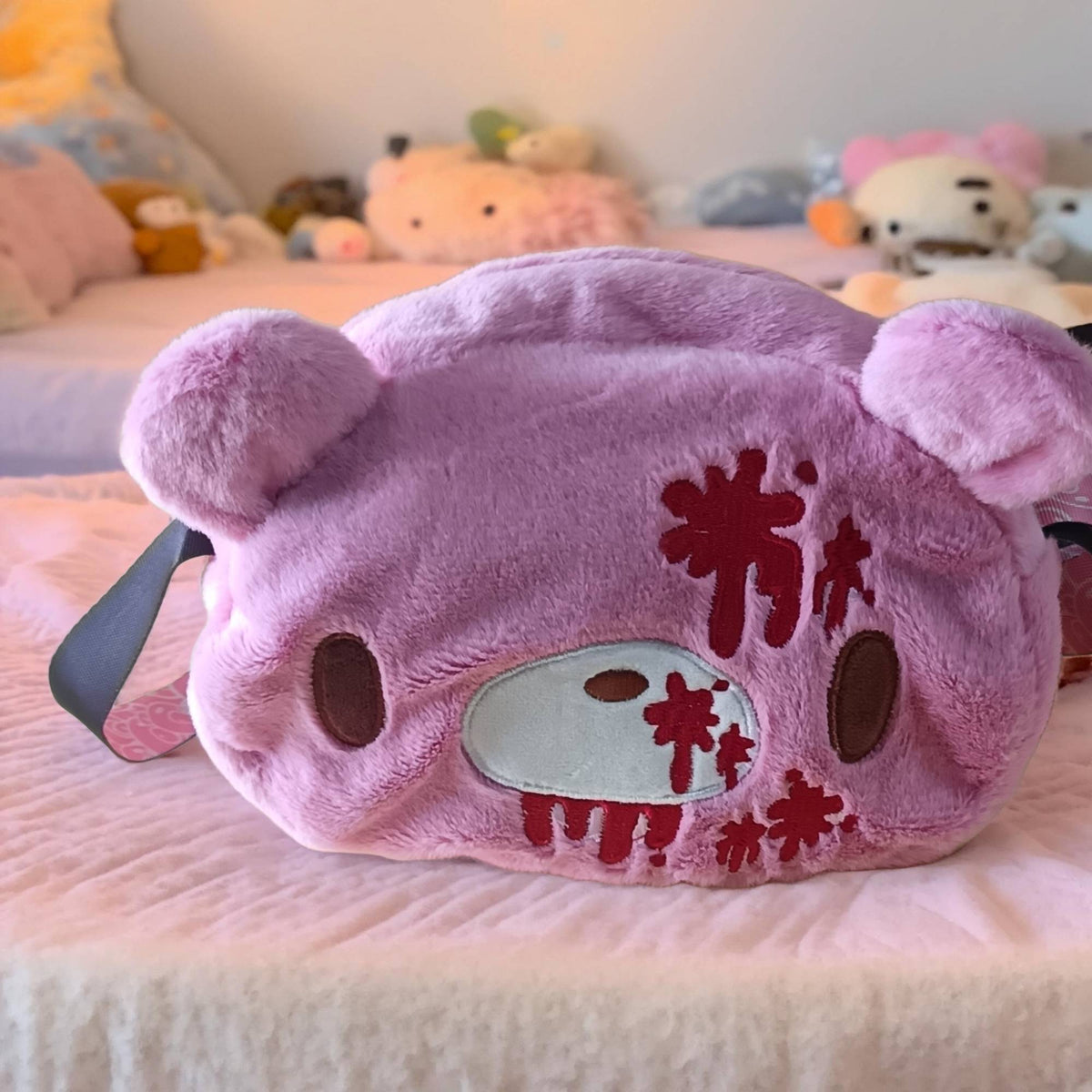 Gloomy Bear plush crossbody bag: Pink, cute - edgy with “blood - splatter” details. A fun, unique pick for fans.