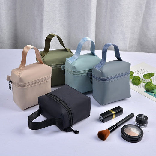 Top selling high-end portable waterproof handle makeup bag, lipstick storage bag, headphone pouch, mini menstrual towel bag