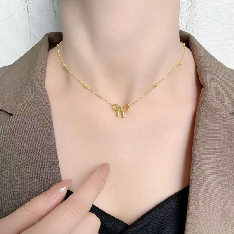 ANENJERY L316 Stainless Steel Beads Chain Hollow Bowknot Pendant Necklace for Women Niche Simple Jewery Accessory