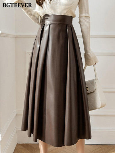 BGTEEVER Spring Autumn Loose PU Leather A-line Skirts Women Elegant High Waist Pleated Faux Leather Skirts Female