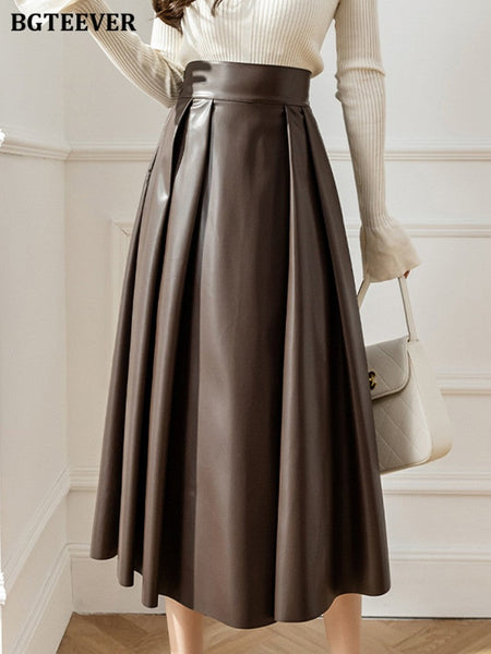 BGTEEVER Spring Autumn Loose PU Leather A-line Skirts Women Elegant High Waist Pleated Faux Leather Skirts Female
