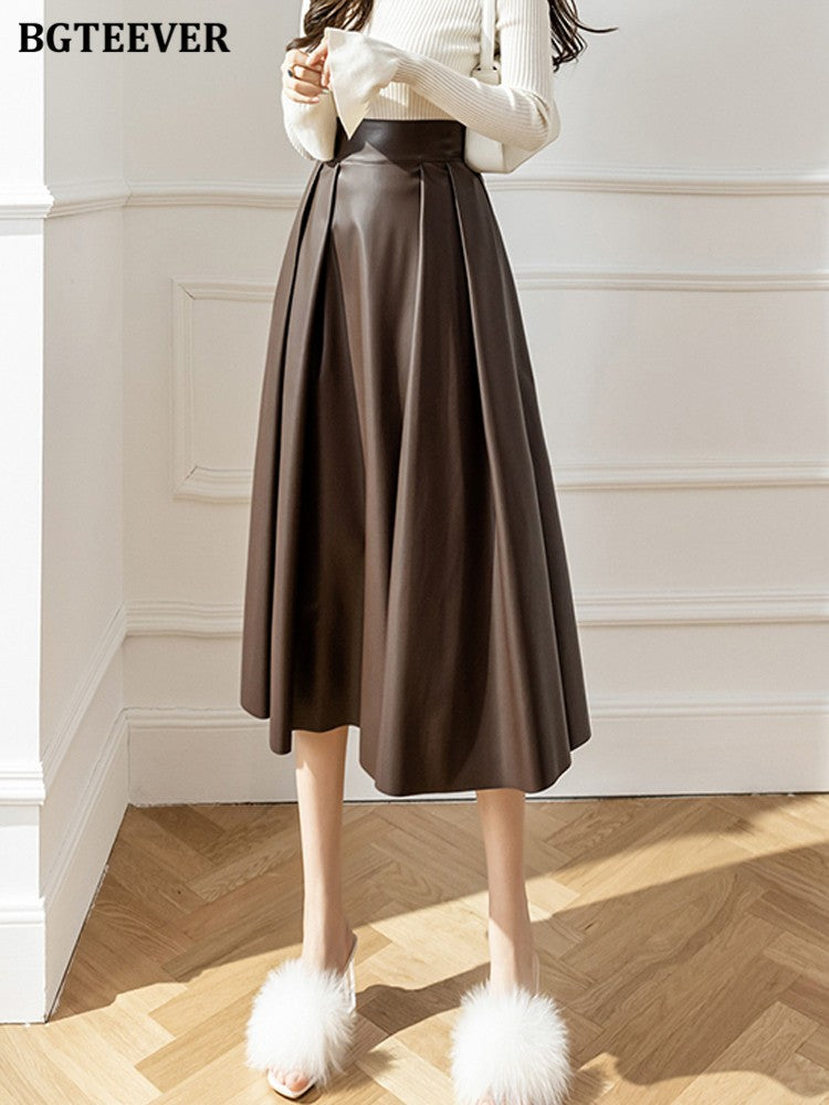 BGTEEVER Spring Autumn Loose PU Leather A-line Skirts Women Elegant High Waist Pleated Faux Leather Skirts Female