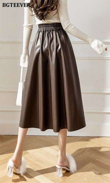 BGTEEVER Spring Autumn Loose PU Leather A-line Skirts Women Elegant High Waist Pleated Faux Leather Skirts Female