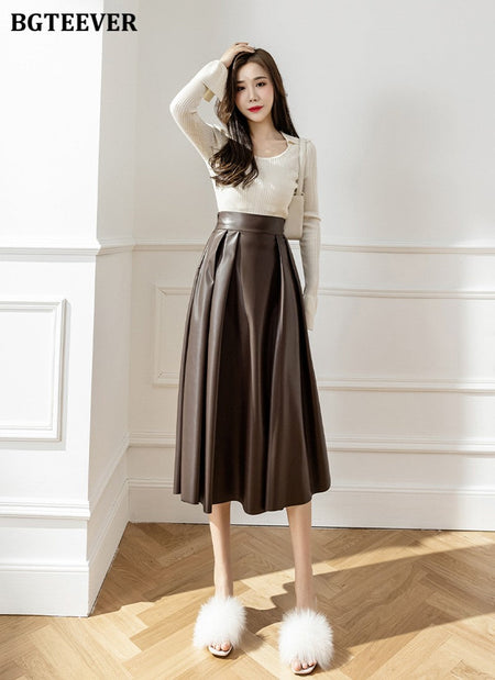 BGTEEVER Spring Autumn Loose PU Leather A-line Skirts Women Elegant High Waist Pleated Faux Leather Skirts Female