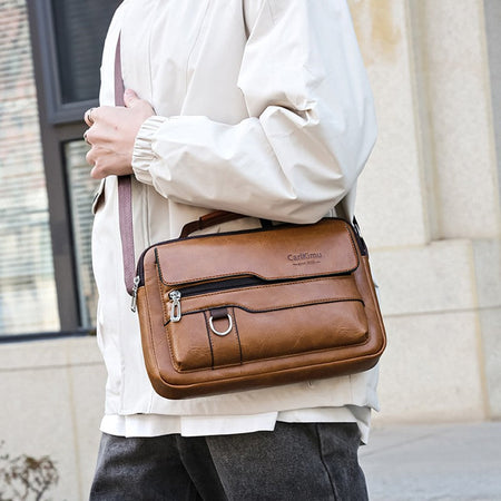 Men's and women's cross-body and shoulder bag for business, simple and casual, with minimalist design. Made of PU material.