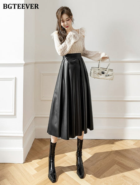 BGTEEVER Spring Autumn Loose PU Leather A-line Skirts Women Elegant High Waist Pleated Faux Leather Skirts Female