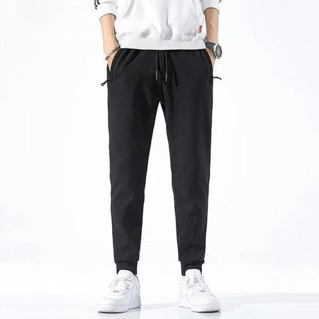 2025 New Men Loose Sweatpants Casual Elastic Drawstring Pants Male Elastic Waist Soft Casual Ankle Band Zipper Pockets Trousers