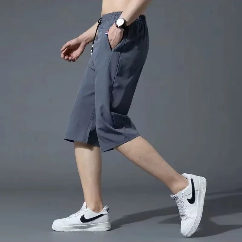 Sport Loose Over Silk Knee Length Pants 2025 Men New Summer Thin Shorts Male Casual Quick Dry Ice Silk Zipper Pocket Capri Pants