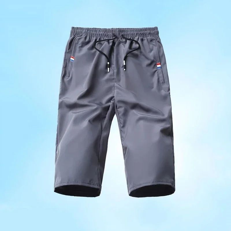 Sport Loose Over Silk Knee Length Pants 2025 Men New Summer Thin Shorts Male Casual Quick Dry Ice Silk Zipper Pocket Capri Pants
