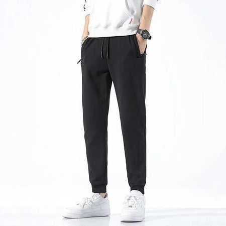2025 New Men Loose Sweatpants Casual Elastic Drawstring Pants Male Elastic Waist Soft Casual Ankle Band Zipper Pockets Trousers