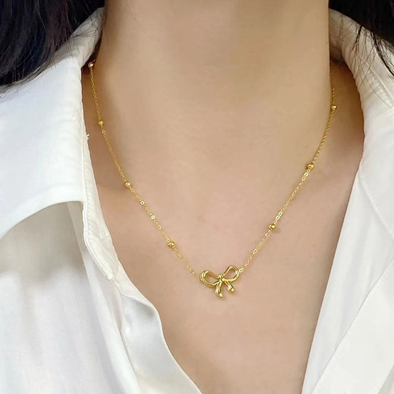 ANENJERY L316 Stainless Steel Beads Chain Hollow Bowknot Pendant Necklace for Women Niche Simple Jewery Accessory