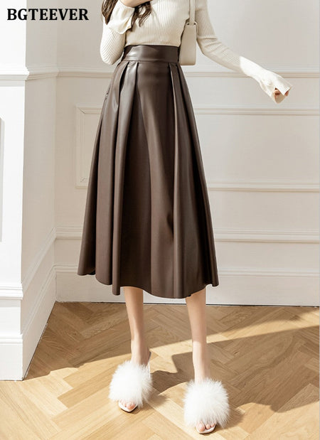 BGTEEVER Spring Autumn Loose PU Leather A-line Skirts Women Elegant High Waist Pleated Faux Leather Skirts Female