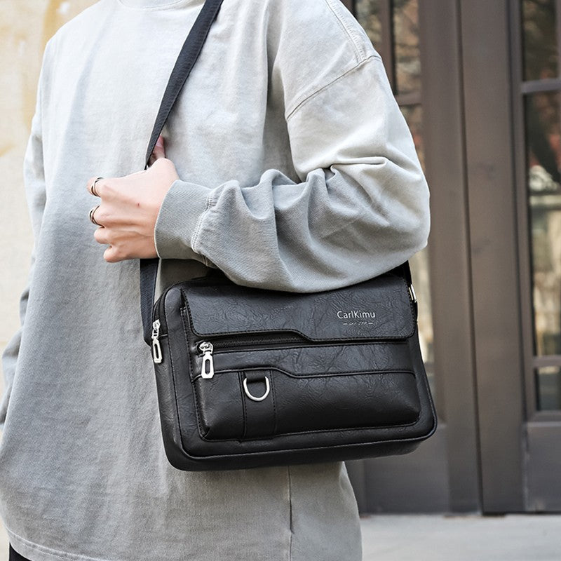 Men's and women's cross-body and shoulder bag for business, simple and casual, with minimalist design. Made of PU material.